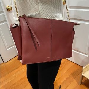 Celine trifold clutch bag with gold chain